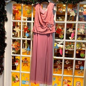 Mauve colored full length lady gown. Size 16. New with original price tags.